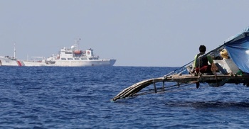 China authorises coast guard to fire on foreign vessels