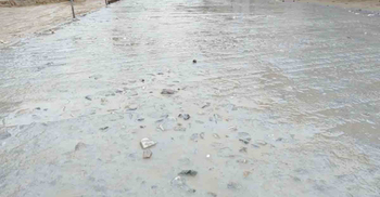 নওগাঁয় রাস্তা নির্মাণে নিম্নমানের কাজের অভিযোগ