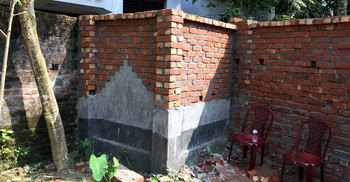 মুক্তিযোদ্ধা বাবার কবরের উপর ছেলের বাথরুম নির্মাণ বন্ধ