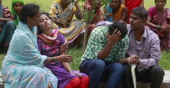 Bus skids off mountain road in northeast India, killing 25