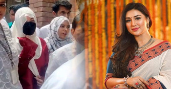হত্যাচেষ্টা মামলায় বোরকা-হিজাব-মাস্ক পরে অপু বিশ্বাসের আত্মসমর্পণ