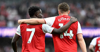 Arsenal power past Fulham to move six points clear