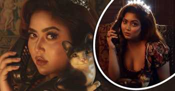 রেট্রো ক্যাট ফোন হাতে ভাবনার স্পুকি গ্ল্যাম