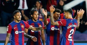 Barcelona beat Real Sociedad to move second