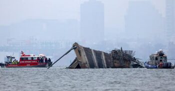 Baltimore divers recover 2 bodies from harbor after bridge collapse