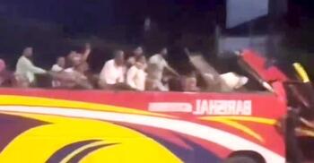 Bus roof torn off in crash, driver continues 5km