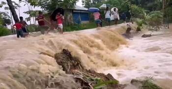 2 die as floods swamp Bangladesh, heavy shower forecasted