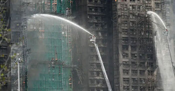 Hong Kong fire death toll rises to 94, scores still missing