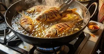 মাছ ভাজার সময় তেলের ছিটা এড়ানোর ঘরোয়া কৌশল