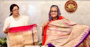 PM receives banana plant fibre made sarees