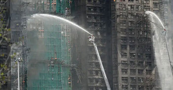Hong Kong fire death toll soars to 128
