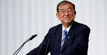 Japan PM vows to stay on despite election debacle