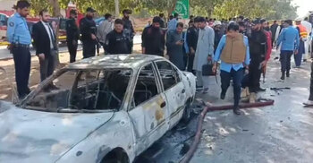 Suicide blast outside Islamabad court kills 12