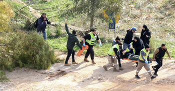Israel kills 15 Lebanese on day troops were due to withdraw