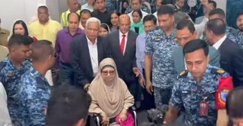 Khaleda returns home after treatment in London
