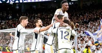 ‘Extraordinary’ Vinicius hits brace as Madrid distance Girona