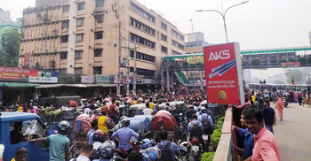 RMG workers block road, stage protest for arrears in Mirpur