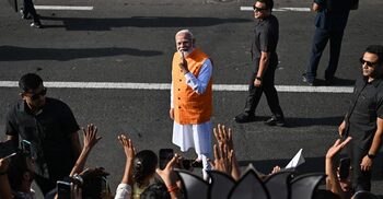 Narendra Modi votes as India’s marathon election heats up
