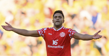 German soccer probes racist abuse of players by fans