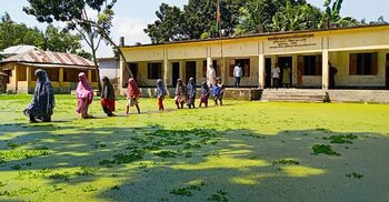 মাদরাসার মাঠে জলাবদ্ধতা, পানি মাড়িয়ে করতে হয় ক্লাস