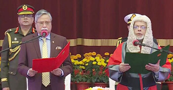 President administers oath to new Chief Justice
