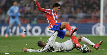 Real Madrid edge Atletico on penalties to reach CL quarters