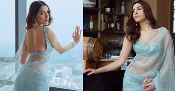 ব্যাকলেস ব্লাউজে আবেদময়ী স্নিগ্ধা