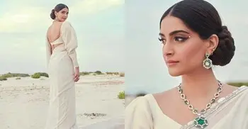 ব্যাকলেস ব্লাউজ ও সাদাশাড়িতে মুগ্ধতা ছড়াচ্ছেন সোনম