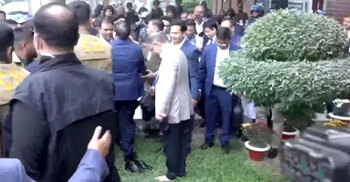 Tarique Rahman touches homeland ground barefoot