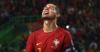 Ronaldo scores twice as he sets men's caps record