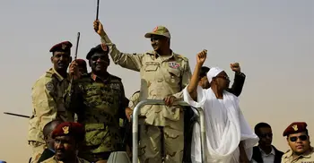 Sudan paramilitaries say they have seized key sites in apparent coup bid