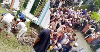 Sayedee laid to rest beside elder son