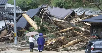 180,000 urged to seek shelter as storm soaks Japan
