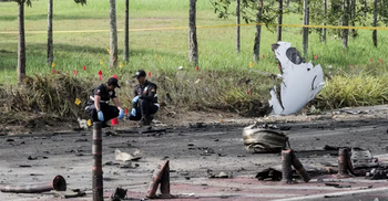 Small aircraft crashes on highway in Malaysia, 10 dead