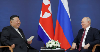 "Comrades" Putin and Kim send rivals a warning