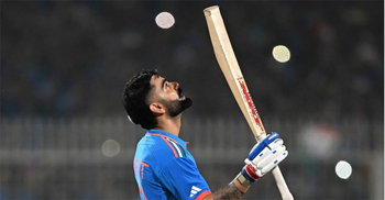 Kohli's record-equalling ton gives India strong total