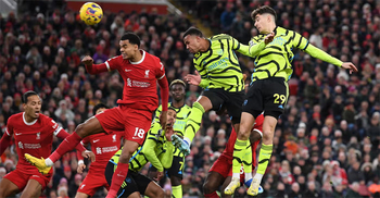 Arsenal stay top after thrilling Liverpool draw