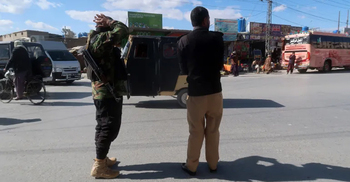 Blasts near Pakistan candidates' offices kill 26 on eve of election