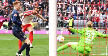 Kane sets hat-trick record as Bayern win 8-1