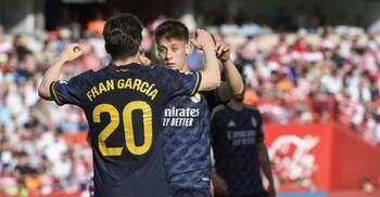 Real cruise past Granada to continue unbeaten run