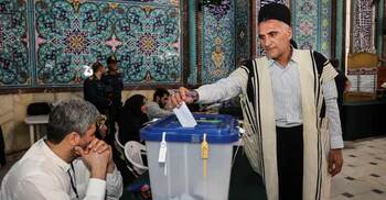 Iran heads to presidential run-off amid record low turnout