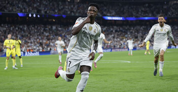 Vinicius leads Madrid to La Liga summit with Villarreal win