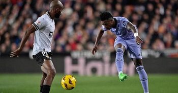 Vinicius scores twice as Real fight back to draw at Valencia