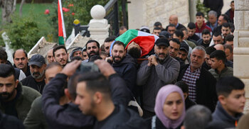 Israeli forces surround hospital, refugee camp in West Bank