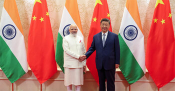 China, India should be partners, not rivals, Xi tells Modi