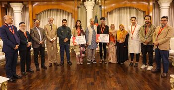 Yunus distributes health cards among July Uprising fighters