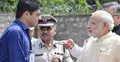 চশমা পরে মোদিকে স্বাগত জানানোয় বিতর্কে কালেক্টর