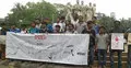 তরুণীদের বস্ত্রহরণ : ঢাবিতে প্রতিবাদ কার্টুন প্রদর্শন
