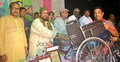 ঠাকুরগাঁওয়ে প্রতিবন্ধী শিশুদের হুইল চেয়ার বিতরণ