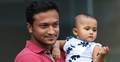 বাবার কোলে নিরাপদ সাকিবকন্যা